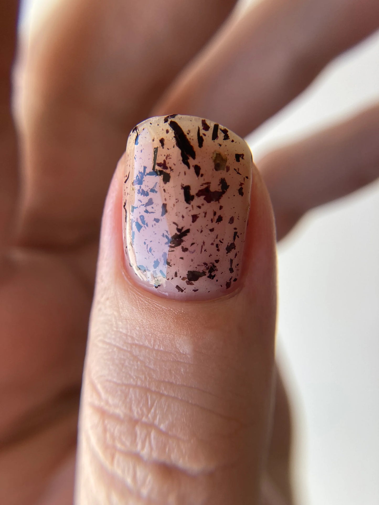 Close up of thumb nailpainted with Death Valley Nails'