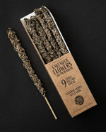 Open box of Lavender Flower and Olibanum incense sticks, 1 stick is removed and sitting next to the box. 