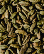 close up of dried cardamom pods