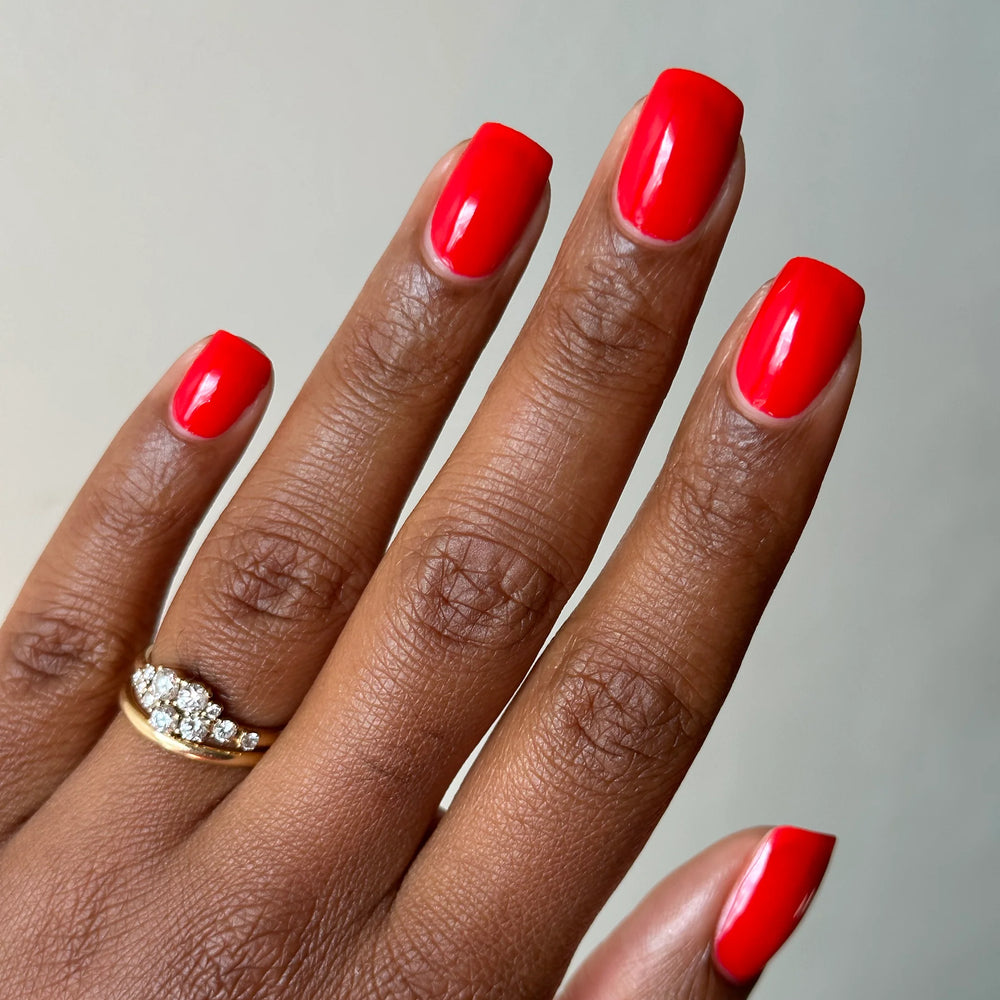 
                      
                        "Shrimps" nail polish shown on model's hand.
                      
                    