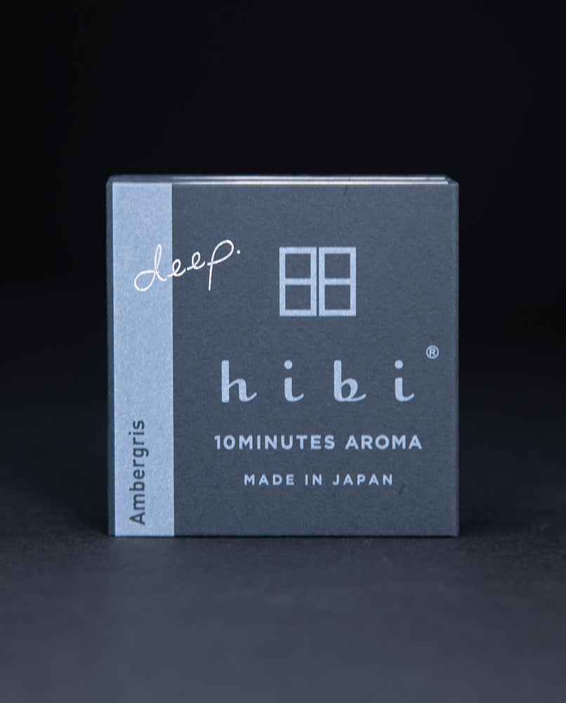 dark slate grey paper box containing HIBI "ambergris" incense matches