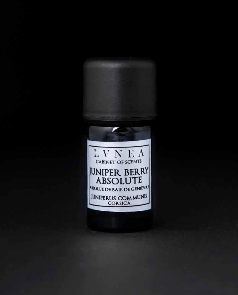5ml black glass bottle of LVNEA's Juniper Berry Absolute on black background. The label on the bottle is silver.