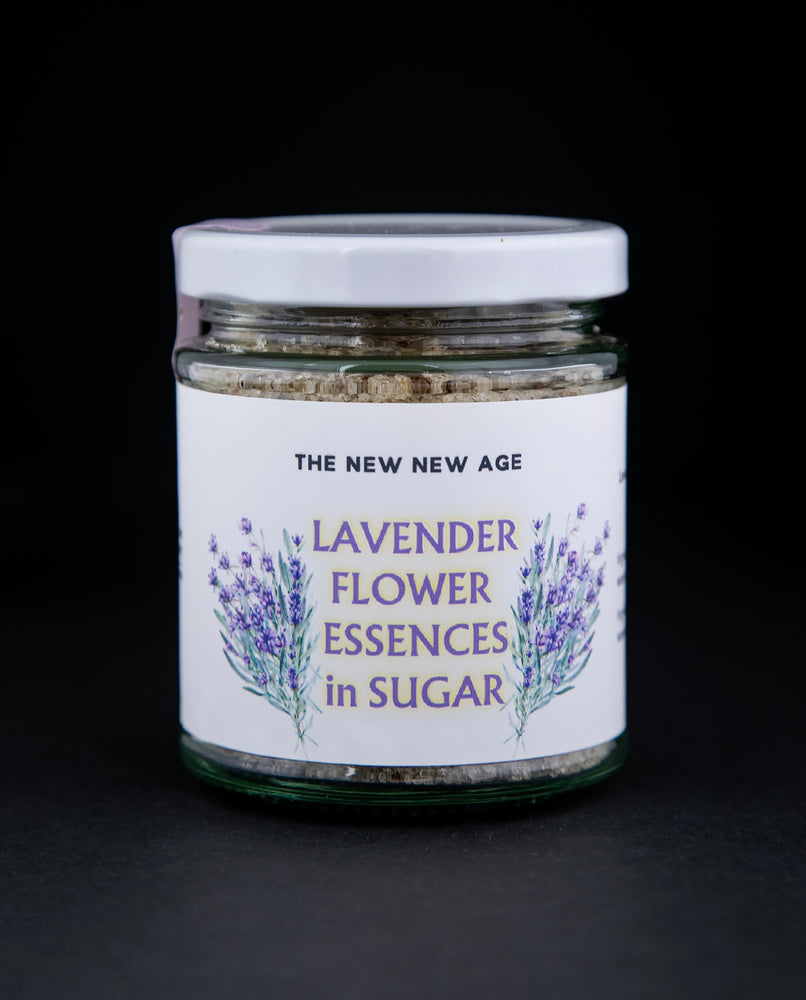 130g clear glass jar of The New New Age's "Lavender Flower Essences in Sugar". There are illustrations of lavender on the label.