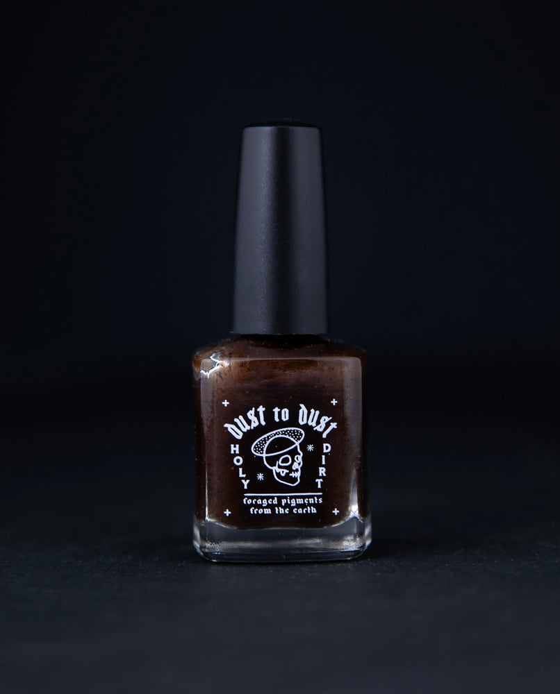 "Reishi" nail polish by Death Valley Nails. The polish is a rich brown colour.