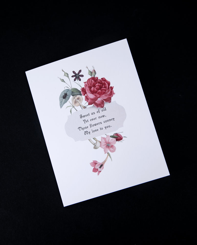 Victorian-inspired greeting card with illustration of roses on its front.