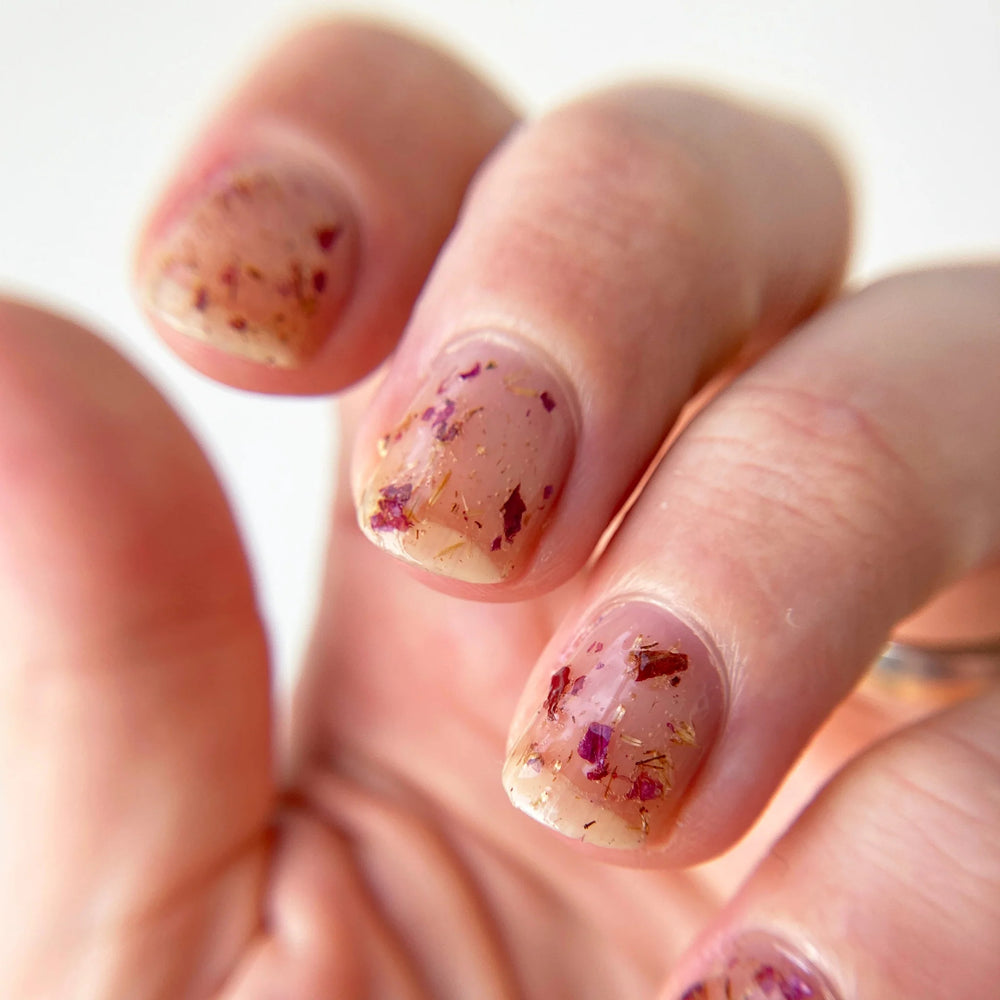 close up of nails painted with Death Valley Nails' "wildflowers" nail polish. 