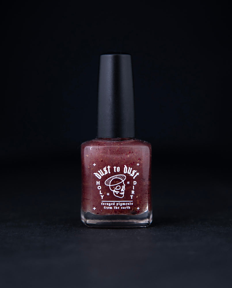 "Willdflowers" nail polish by Death Valley Nails. The polish is an earthy rose colour.