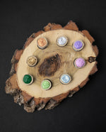 Wooden paint palette crafted from a raw cut of balsam poplar, filled with 8 watercolour paintstones.