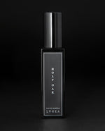 30ml black glass bottle of LVNEA’s Holy Oak natural perfume on black background