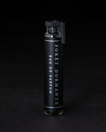 2ml glass sample vial of LVNEA's Forêt Dormante natural perfume on black background