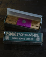 Open box of Incausa's Rosemary "Espiritvs" incense on dark wooden background