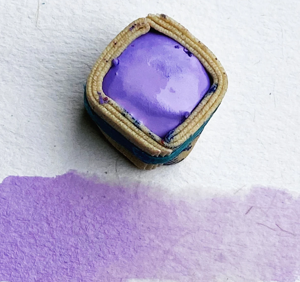 Swatch of Beam Paints' pastel purple "Lilac" watercolour paintstone.