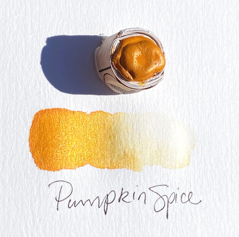 Swatch of Beam Paints' irridescent orange-coloured "Pumpkin Spice" watercolour paintstone.
