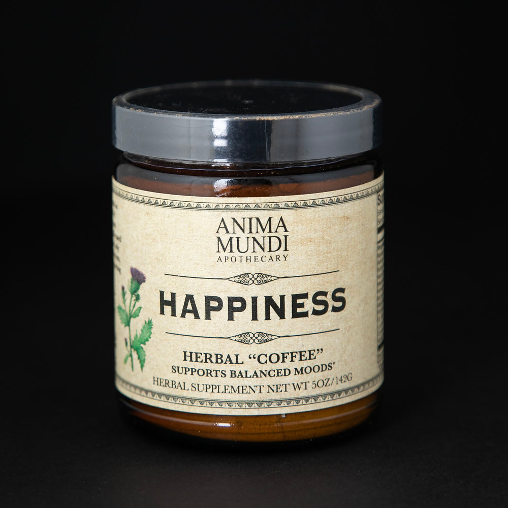Amber glass jar with tan label reading 'Happiness Herbal "Coffee". It contains a herbal supplement by Anima Mundi.