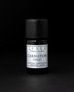 5ml black glass bottle with silver label of LVNEA's carnation absolute on black background