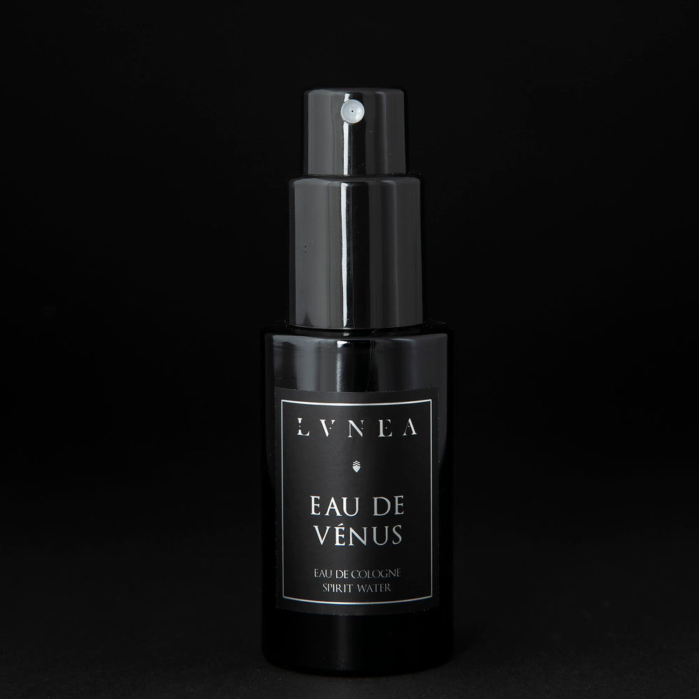 
                      
                        50ml black glass bottle of LVNEA’s Eau de Venus natural fragrance on black background
                      
                    