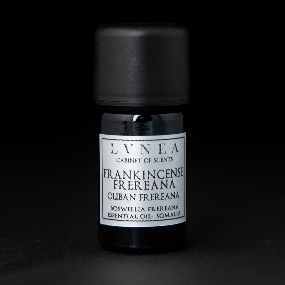 
                      
                        5ml black glass bottle with silver label of LVNEA's frankincense frereana essential oil on black background
                      
                    