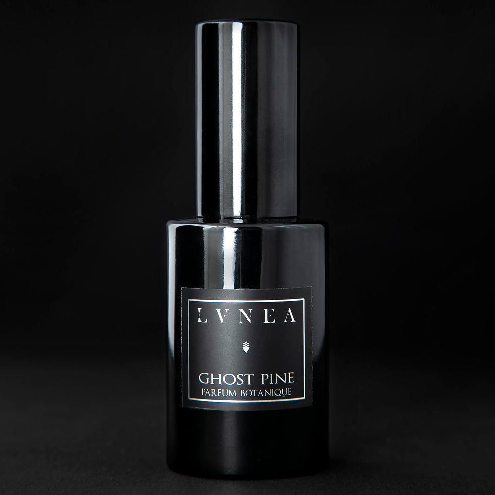 
                      
                        30ml black glass bottle of LVNEA best-selling natural perfume Ghost Pine on black background
                      
                    