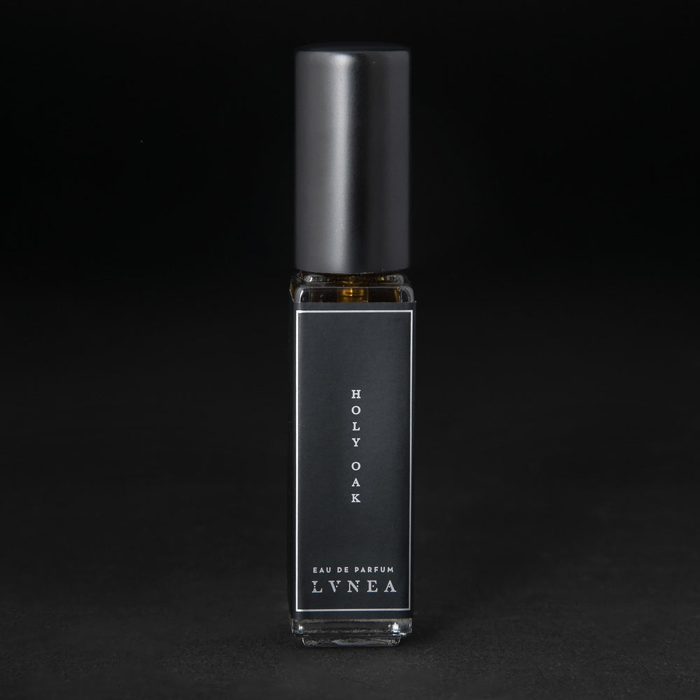 
                      
                        8ml clear glass bottle of LVNEA’s Holy Oak natural perfume on black background
                      
                    
