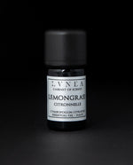 5ml black glass bottle of LVNEA's lemongrass essential oil on black background. The label on the bottle is silver.