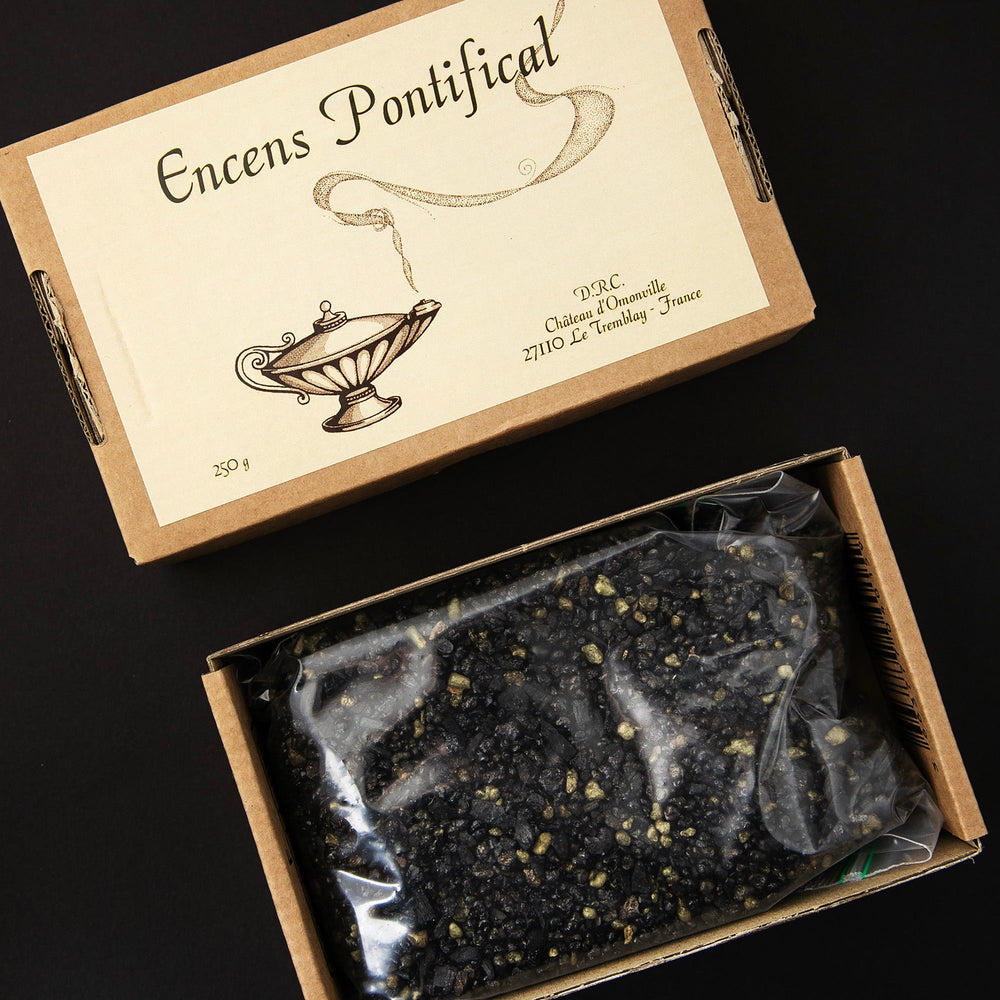 
                      
                        Opened box of Pontifical Incense, revealing a bag filled with the loose resin incense.
                      
                    