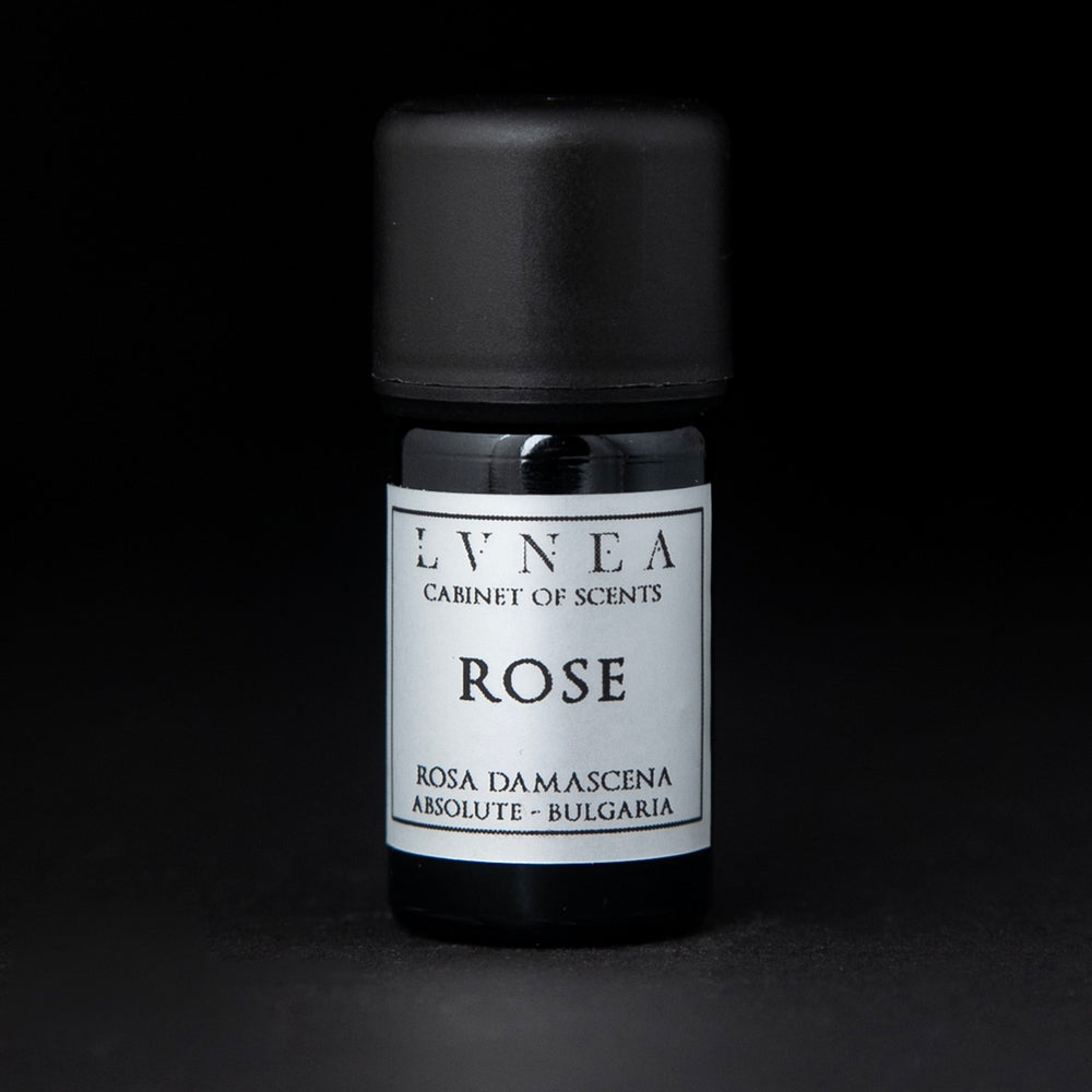 
                      
                        5ml black glass bottle of LVNEA's rose absolute on black background. The label on the bottle is silver.
                      
                    