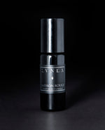10ml black glass bottle of LVNEA's Saffron Rouge natural roll on perfume oil on black background