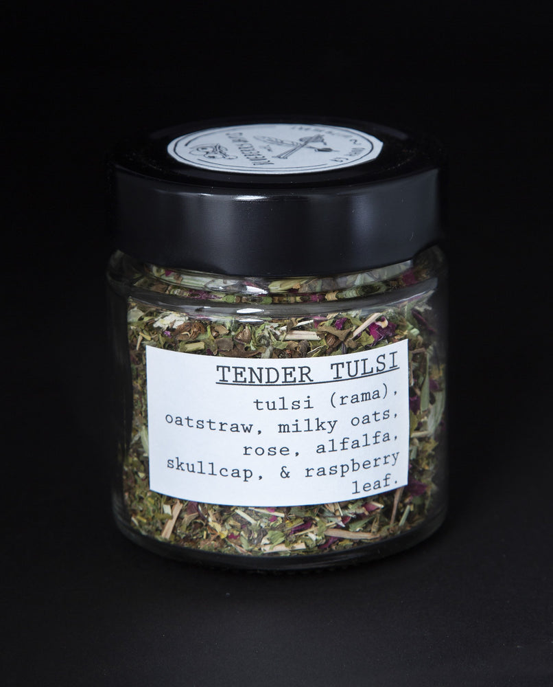 Clear glass jar of blueberryjams' "Tender Tulsi" herbal tea blend